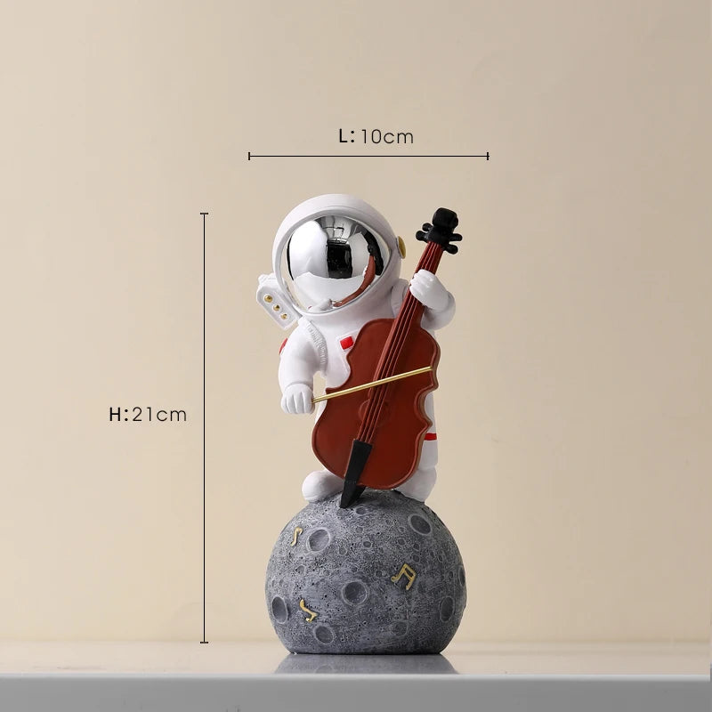 statue astronaute résine saxophone doré guitare violoncelle moderne décoration intérieure chambre salon