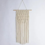 tapisserie macramé boho chic beige motifs géométriques franges moderne suspension maison