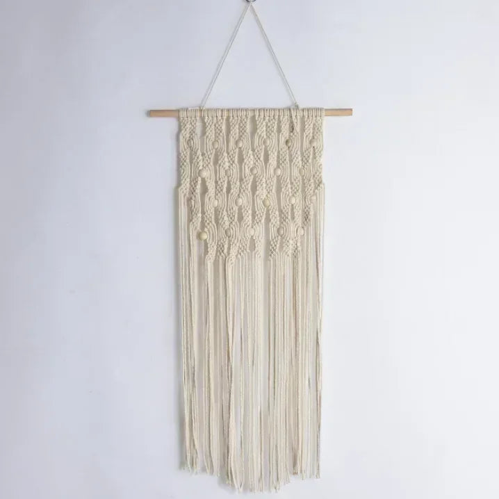 tapisserie macramé boho chic beige motifs géométriques franges moderne suspension maison