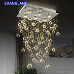 suspension lumineuse moderne transparente cristal brillantes élégante dorée fixations invisibles chaînes incluses