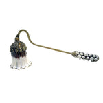 extingueur bougie longue poignée métal fleur stylisée élégant décoration maison cadeau événement