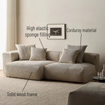 canapé modulaire velours rayures beige clair moderne salon bois oreillers minimaliste