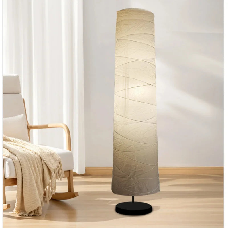 lampe sol moderne abat jour blanc rayures horizontales opacité base noire câble électrique 22cm
