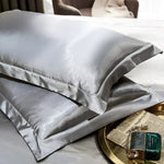 protège oreiller soie uni moderne beige gris rose vert violet bleu opulent brillant 48x74cm