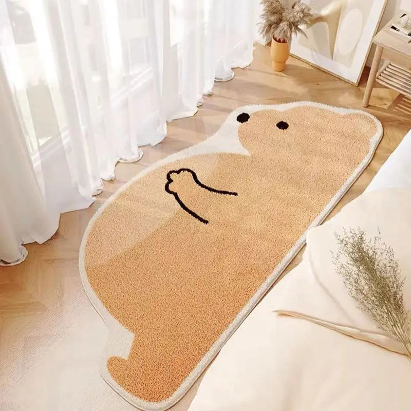 Un tapis moelleux en forme d'ours brun, agrémentant joliment l'espace et créant une ambiance chaleureuse et conviviale.