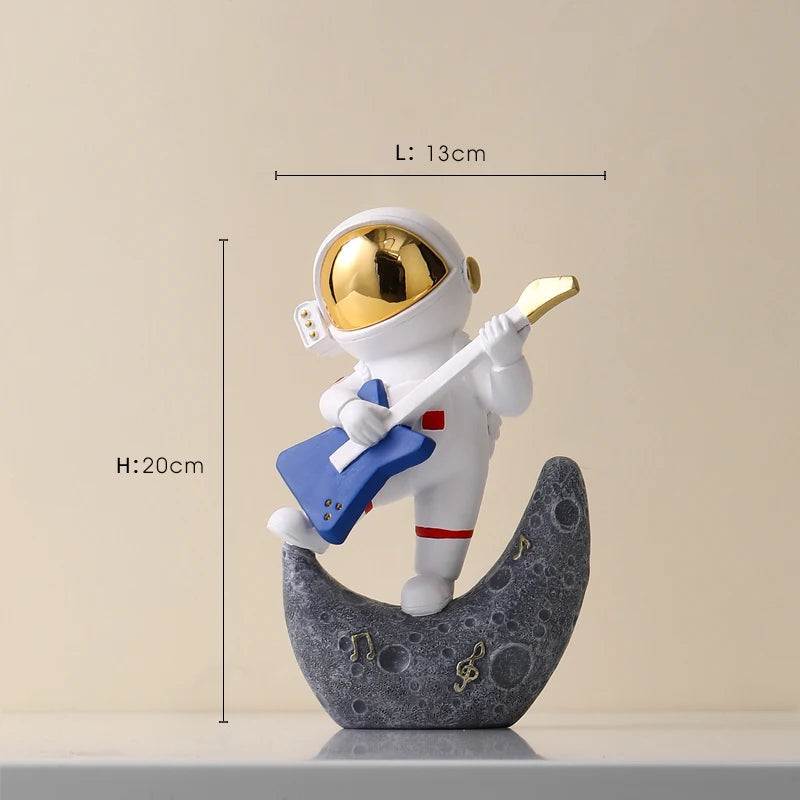 statue astronaute résine saxophone doré guitare violoncelle moderne décoration intérieure chambre salon