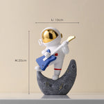 statue astronaute résine saxophone doré guitare violoncelle moderne décoration intérieure chambre salon