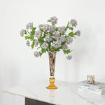 vase verre ambré motif moucheté moderne décoration intérieure bougie papillon fleurs violettes chandelier
