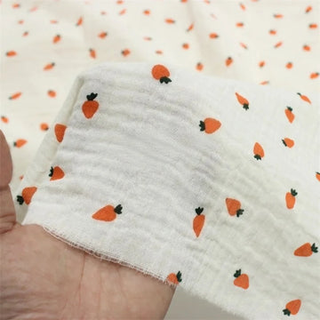 tissu popeline coton imprimé carottes blanc orange vert fond texturé décontracté enfantin respirant 135cm
