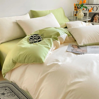 Housse de couette zippée en coton égyptien 400 fils couleur unie sur lit