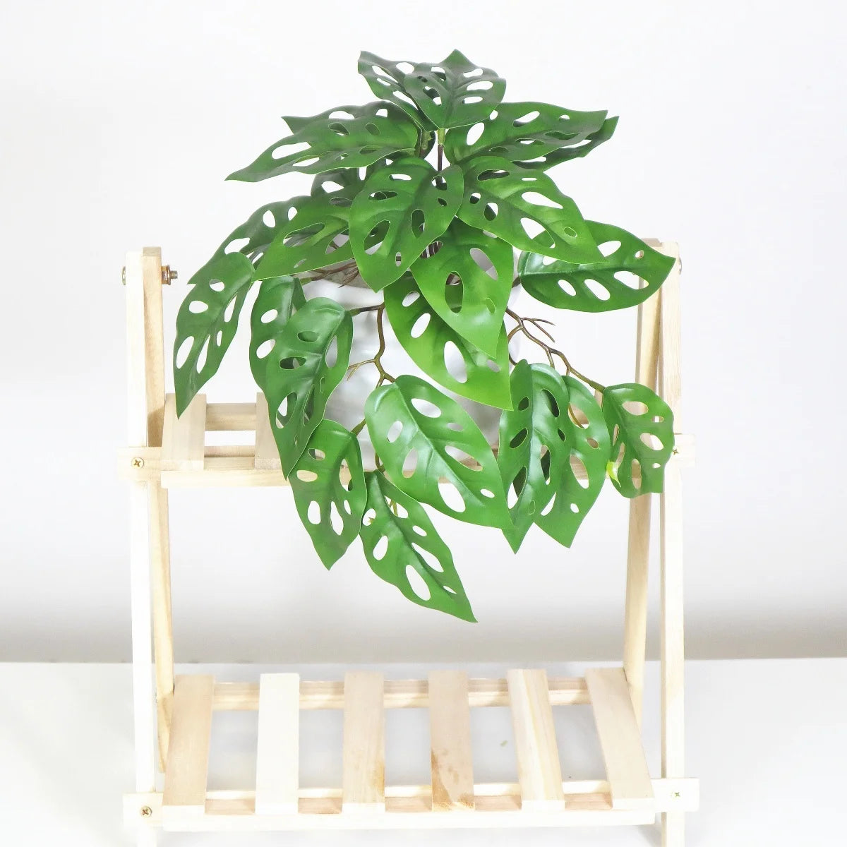 plantes artificielles vertes feuilles perforées modernes décoration intérieure pot tropical