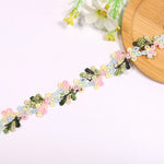 ruban decoratif brode fleurs motifs floraux couleur rouge rose vert blanc jaune solvable eau