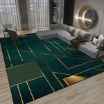 Le tapis vert et doré ornés de motifs géométriques raffinés crée un décor moderne et sophistiqué dans ce salon élégant.