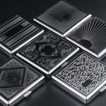 boîtes cigarettes argentées émaillées motifs floraux géométriques pliables contenant cigarettes classiques
