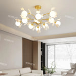 lampe suspendue contemporaine or blanc fleurs opalescente 10 têtes chaîne neutre