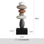 Sculpture moderne résine blanche gris noir lisse inspiration naturelle minimaliste base carrée noire