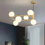 Détail du verre blanc et des finitions métal du lustre suspension