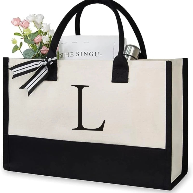 sac main toile lettre imprimée blanc noir rubans classique poignées intérieur noir zippé capacitaire