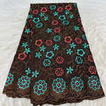 tissu dentelle coton brodé fleurs motif broderie africaine voile suisse vêtement élégant