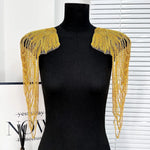 accessoire textile broche franges rouge or noir élégant chic festive decoration