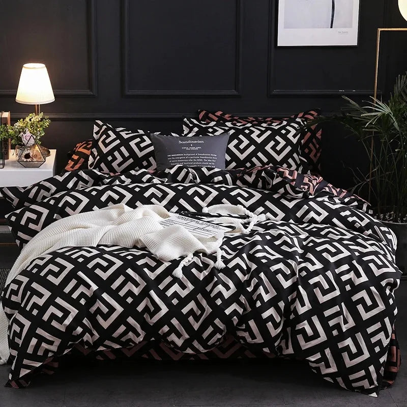 Parure de lit noire luxe avec housse de couette et taies d'oreiller sur un lit