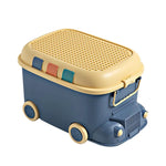 boîte rangement bus bleu beige orange jouets tapis moderne enfantin poignées dorées textures roues