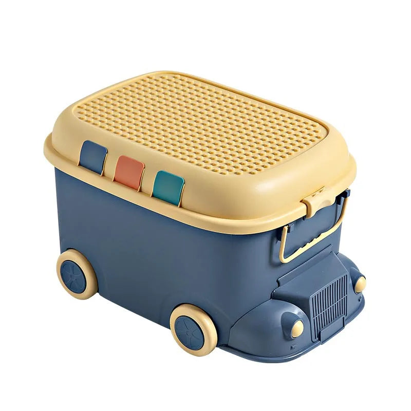 boîte rangement bus bleu beige orange jouets tapis moderne enfantin poignées dorées textures roues