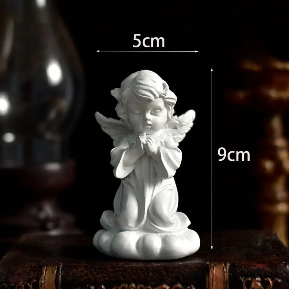 statuette ange résine blanche classique livre coquillage ornement sans odeur sculpteur fée