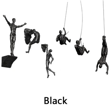 ornements statuettes grimpeurs noir sculptures détaillées art contemporain fixations chaînes socles décoration murale
