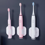 support mural minimaliste adhésif rose blanc brosse dents électrique charge câble lisse moderne