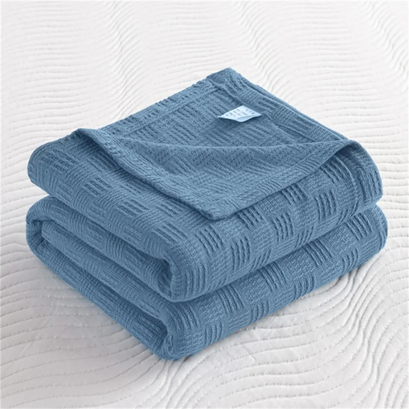 couverture coton tricotée motif géométrique bleu gris jaune canapé lit maison voyage été