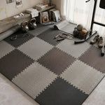 tapis sol modulable caoutchouc gris noir blanc carreaux géométriques antidérapant exercices maison