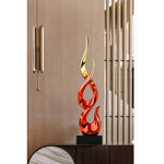 sculpture abstraite moderne rouge or argent noir torsadée fluidesDecoration intérieure résine haute qualité