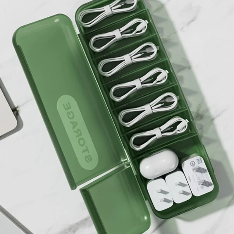 boîte rangement câbles accessoires électroniques vert moderne organisation écouteurs adaptateur usb minimaliste
