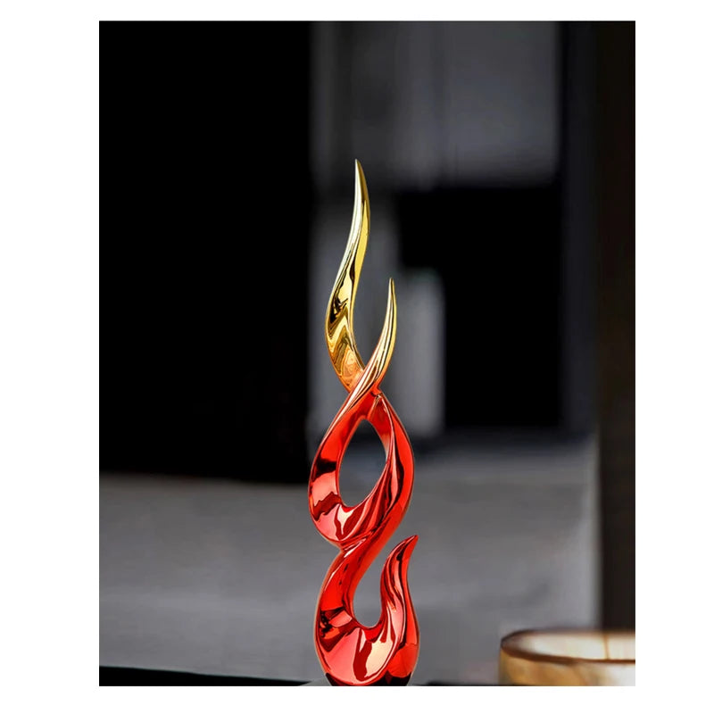 sculpture abstraite moderne rouge or argent noir torsadée fluidesDecoration intérieure résine haute qualité