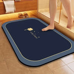 Tapis de sol antidérapant bleu marine avec logo en forme de trèfle à quatre feuilles pour une relaxation agréable.