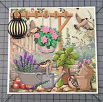 découpe papier scrapbooking fleurs bancs table chaises lanterne arbres pommes oiseaux arches végétales motifs