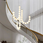 suspension lumineuse moderne minimaliste cactus blanc opalescent câbles dorés chambre salon