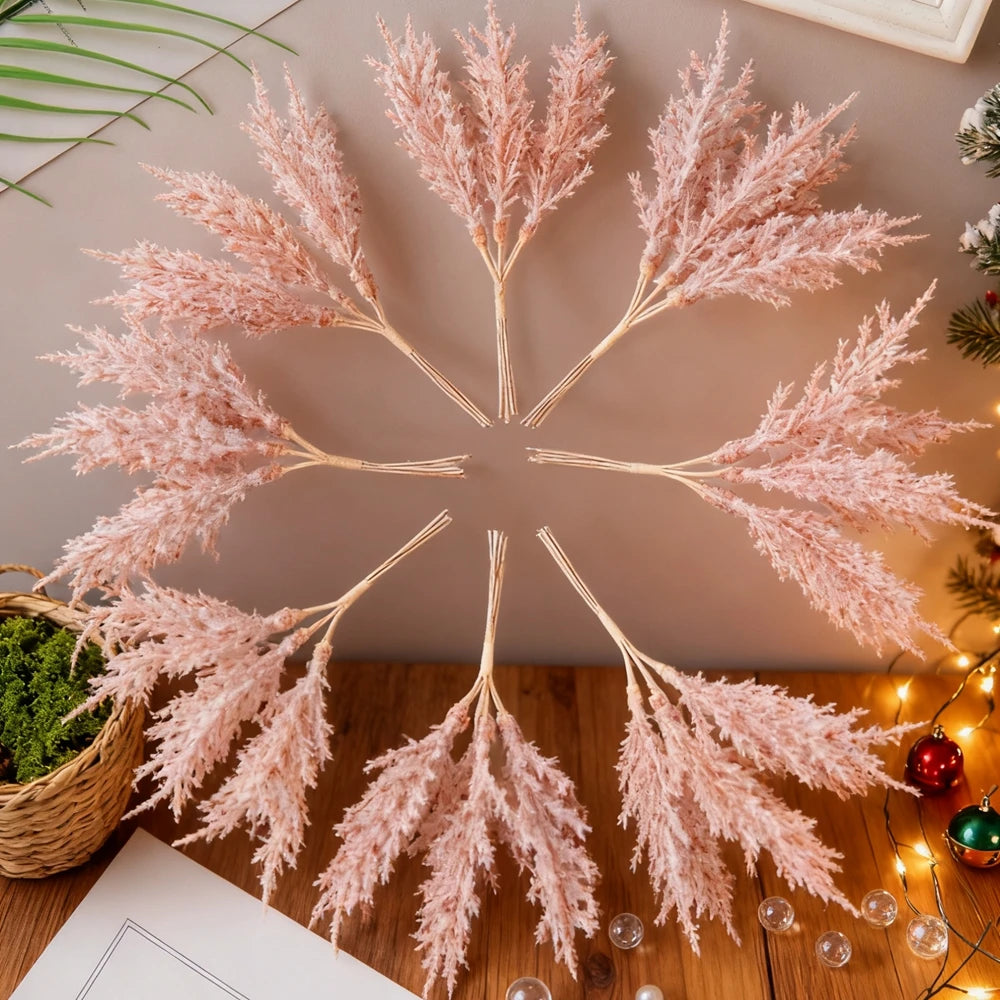 décoration noël plumes artificielles branches feuilles pin pommes coton rouges traditionnellements