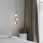 suspension lumineuse moderne sphères translucides structure métallique noir blanc minimaliste plafonnier led contemporain