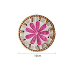 tapis tasse bohème motifs floraux assiettes décoratives cercles colorés bord marron tresse artisanal table