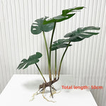 décoration murale moderne plante artificielle feuilles vertes racines apparentes salon chambre coucherextérieur