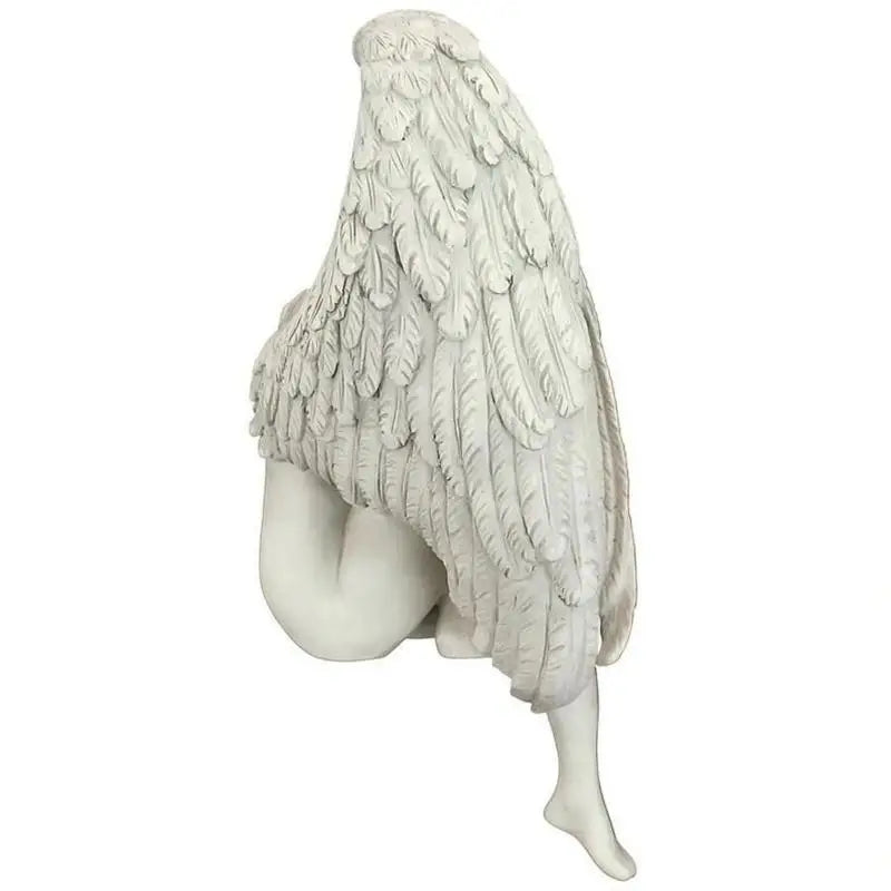 statue ange blanc accroupi ailes plumes texture lisse jardin intérieur décoratif artistique