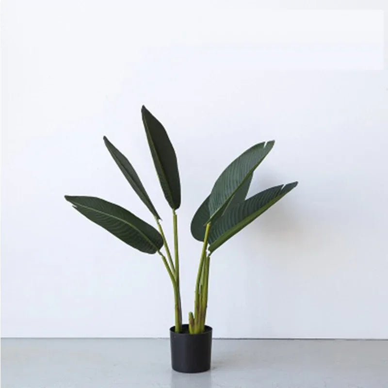 plantes artificielles arbres extérieures modernes vertes feuilles larges nervures apparentes pot noir tropical minimalisteextérieur