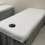 couverture table massage blanche tissu lisse hexagonal hygiène professionnel pliée relaxation salon beauté