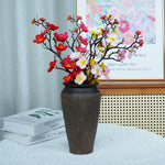 décoration intérieure branche artificielle fleurs simples couleur rouge blanc rose jaune naturel minimaliste