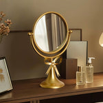 miroir table rotatif or noir rose poudré élégant vintage rubans crèmes aromathérapie