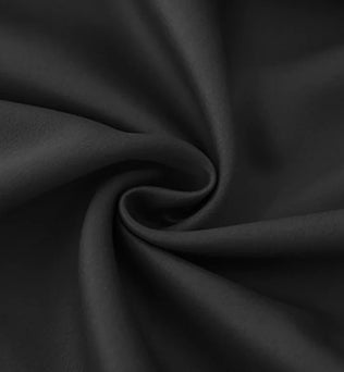 Texture douce et élégante en spirale noire, idéal pour la mode ou la décoration intérieure, ajoutant une touche sophistiquée à tout design ou projet créatif.