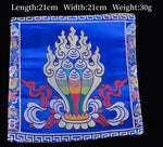 serviettes traditionnelles multicolores brodées motifs floraux géométriques opaques