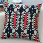 housse coussin imprimée moderne motifs géométriques bleu rouge noir 45x45cm